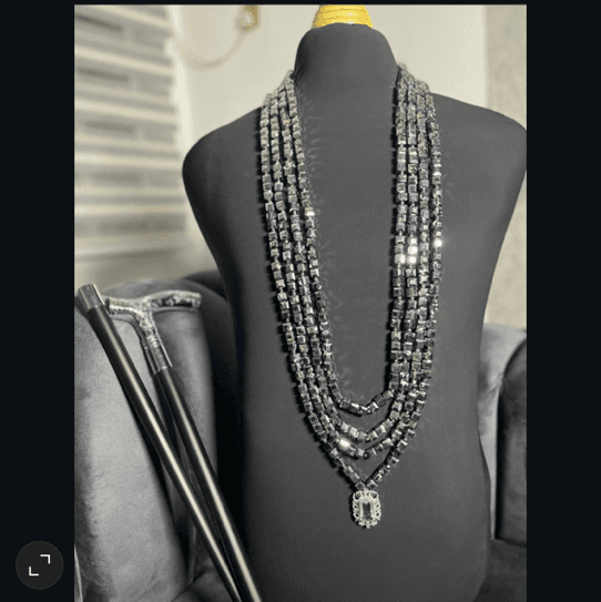 Neck beads on agbada